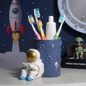 lot 381 image: Ferrochef Space Astronaut Toothbrush Holder for Bathroom and Office Desk - Retail $18