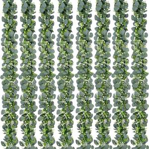 lot 561 image: Waipfaru 8Pcs Eucalyptus Garland, 5.9FT Greenery Garland, Green Garland with Flowers, Artificial Faux Silver Dollar Eucalyptus Leaves Vines for Table Home Wedding Mantle Party Indoor Outdoor Decor - Retail $50