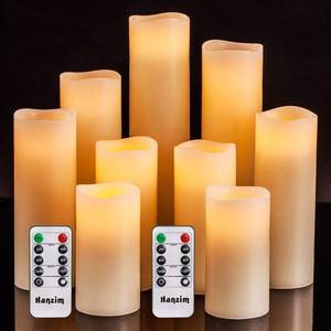 lot 618 image: Flameless Battery Operated LED Pillar Candles with Remote control 9pack - Retail $21