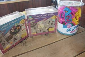 lot 4076 image: NIP Wilton Cookie Cutters & Candy Molds