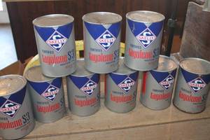 lot 4141 image: 9 Full Cans Skelly Motor Oil