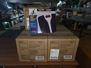 lot 33 image: 7 cases of Health o Meter digital scales. 3 in each box.  Brand new.