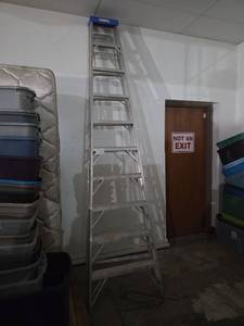lot 216 image: 10 ft Aluminum Ladder with Blue Top Cap