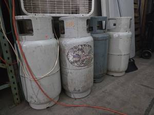 lot 229 image: Lot of 4 Forklift Propane Cylinders. One of them feels pretty full.