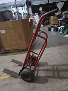 lot 248 image: Red Two-Wheel Hand Truck Dolly with Pneumatic Tires
