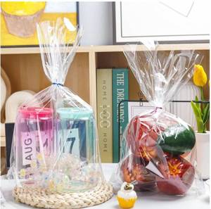 lot 73802 image: Cellophane Bags, Counter Displays, use them for cookie bundles, popcorn, 12x16. Count Unknown. - Retail $11