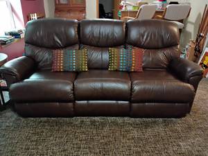 La Z Boy Brown Leather Couch with Recliners on both ends.  Really Nice!  Located in basement.  39 x 78 x 30