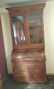 Vintage Victorian Style Walnut Cylinder Secretary Desk with Upper Glass Door Bookcase.   3 Drawers on bottom with storage. 86 x 39 x 21.  Located in basement