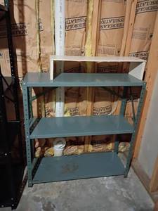 lot 935 image: Smaller Metal Shelf.   37 x 36 x 12.   Located in basement