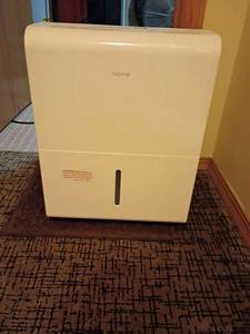 lot 938 image: Home Dehumidifier.   Located in basement