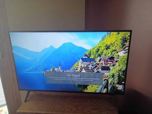lot 940 image: 44in LG Smart Television with Remote