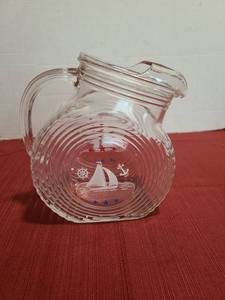 lot 1235 image: Glass Pitcher with Sailboat Anchor Wheel Star Design