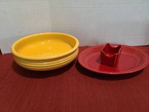 lot 1241 image: Yellow Bauer footed serving bowl, Fiestaware oval platter, sugar bowl