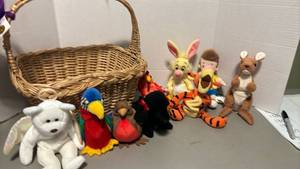lot 1300 image: Winnie the Pooh Character Plush Toy Lot and Beanie Babies with Wicker Basket