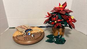 lot 1304 image: Lego Poinsettia and wooden marble game with marbles