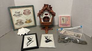 lot 1306 image: Decorative Lot - Ceramic Birdhouse on stand, tea cup trivet, foreign money and more  Collectibles