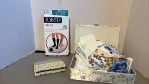 lot 1331 image: Compression Socks One Pair Black, hanging clips and a box of vintage hankies