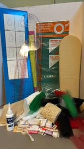 lot 1347 image: Fashion rulers, cutting mat, sleeve iron pad, material and elastic scraps and more