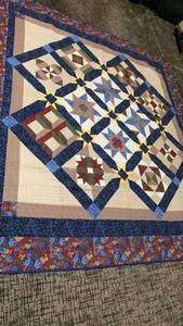 lot 1421 image: Patchwork Quilt with Star and Geometric Blocks Navy Blue Borders 85X76