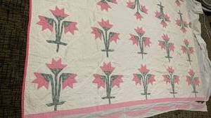 lot 1431 image: Quilted Bedding with Pink Tulip Applique Pattern  78X64