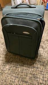 lot 1446 image: Samsonite Upright Rolling Luggage Carryon Suitcase 23X14