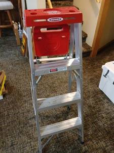 lot 2006 image: Werner 4 ft Aluminum Step Ladder 200 lb Capacity located in basement