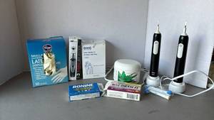lot 3011 image: Nose hair trimmer - new in box, electric toothbrushes, Covid tests and more