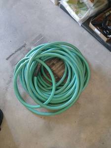 lot 3041 image: Garden hose unknown  length untested
