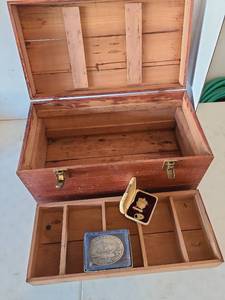 lot 3109 image: Wooden hinged case, 10x19.5x10, merit medal and bar, and  Veterans of Foreign Wars belt buckle