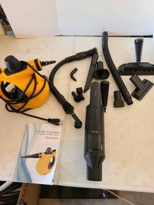 lot 3111 image: Wyze hand-held steam cleaner with attachments