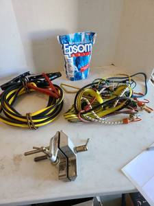 lot 3149 image: Booster cables, corner clamps, bungee cords and Epsom salt.
