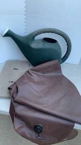 lot 3235 image: Watering Can with Soaker Bag and kneeling pad
