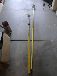 lot 3506 image: Light bulb changing tool and paint extender