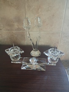 lot 1047 image: Vintage Swarovski Crystal Double Pin Candle Holder featuring faceted crystal elements and flower-motif saucers with metal spike pins for holding candle and double Roses with no visible markings