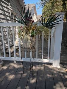 lot 970 image: Metal Plant Stand with Faux Arrangement.  Stand is