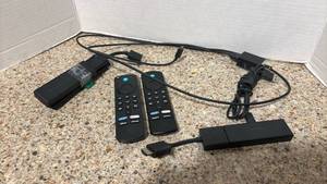 lot 1100 image: Fire TV Stick Media Streamer with Remote Controls and Power Cables
