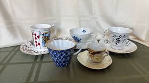 lot 1115 image: Lot of 6 Decorative Teacups and Saucers Playing Cards Blue Floral Musical Notes