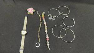 lot 1605 image: Bracelets, watch and pin