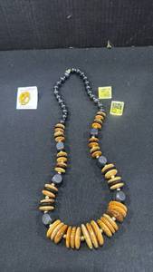 lot 1609 image: Wooden beaded Necklace and pins