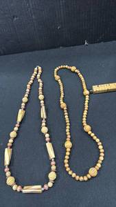 lot 1610 image: Wooden beaded necklaces and keychain