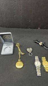 lot 1611 image: Watches, monogramed pocket watch, smart watch band and key chain