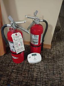 lot 2045 image: 2 Fire Extinguishers and a Carbon Monoxide Alarm