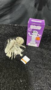 lot 6 image: Airdorable Airblown Inflatable Mummy 18.5 in 47 cm and assorted bones