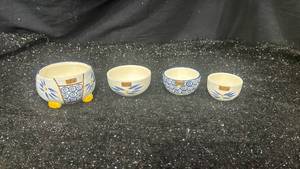 lot 34 image: Temptations 4-Piece Nesting Bowl Set Blue White Ceramic