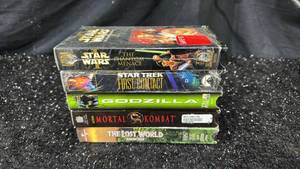 lot 47 image: 5-Movie VHS Lot Star Wars Phantom Menace, Star Trek First Contact, Godzilla, Mortal Kombat, Lost World