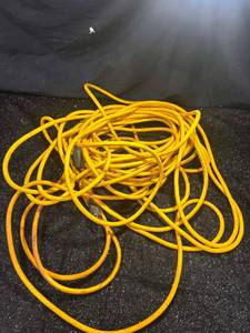 lot 111 image: Yellow Extension Cord Coiled with Connectors
