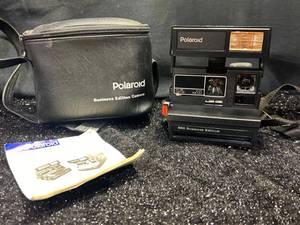 lot 124 image: Polaroid 600 Business Edition Instant Camera with Case and Manual