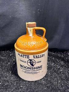 lot 127 image: McCormick Platte Valley Moonshine 100% Straight Corn Whiskey Jug 80 Proof