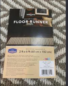 lot 48 image: Mohawk Home Everyday Floor Runner in a beige and grey patterned, textured loop design, measuring 2 ft x 6 ft  - Retail $0