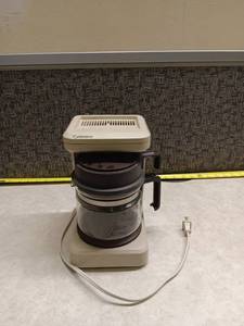lot 1320 image: Norelco Drip Coffee Maker with Glass Carafe, Untested